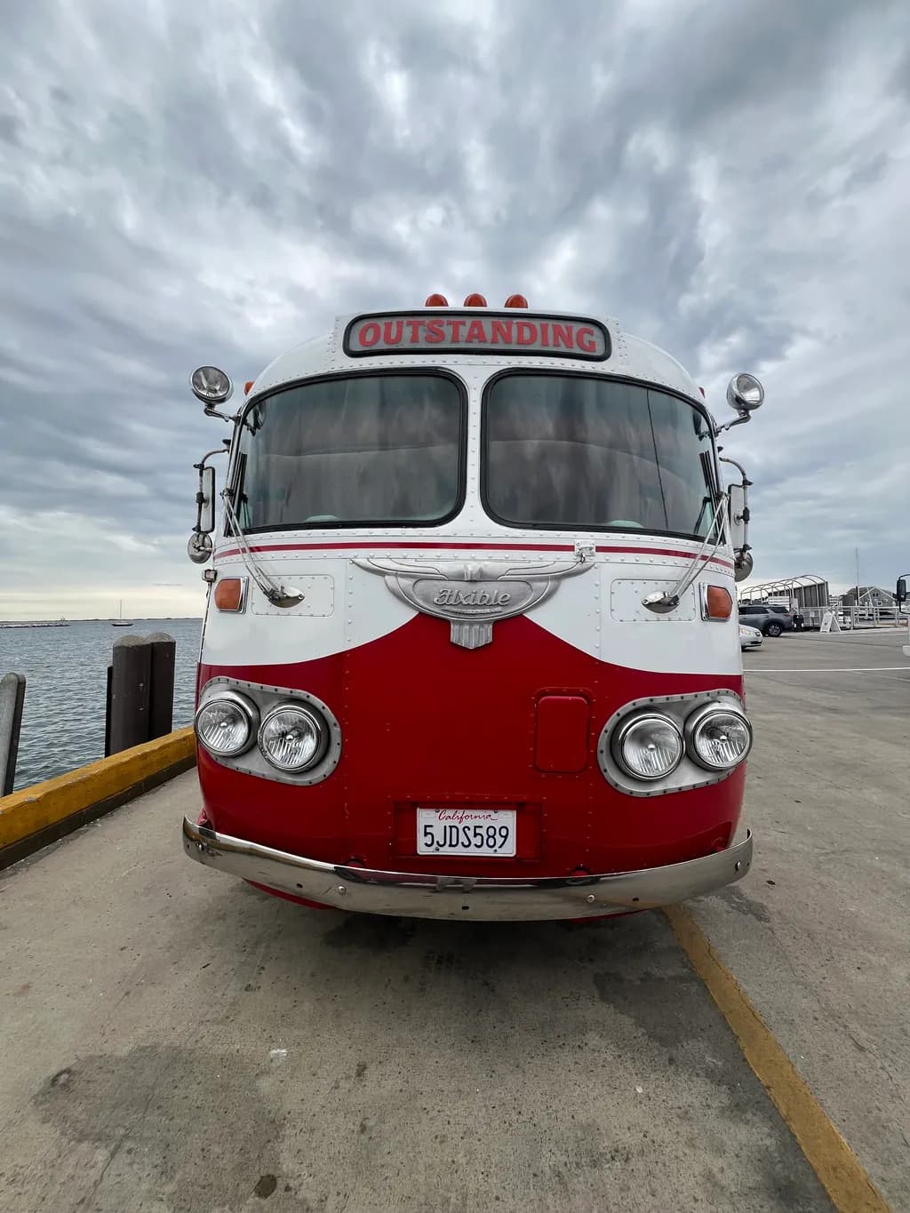 Vintage Charm: The Outstanding Journey of a Classic Red and White Bus