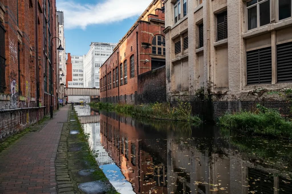 Urban Reflections: A Serene Stroll Along the Waterway of Forgotten Industry