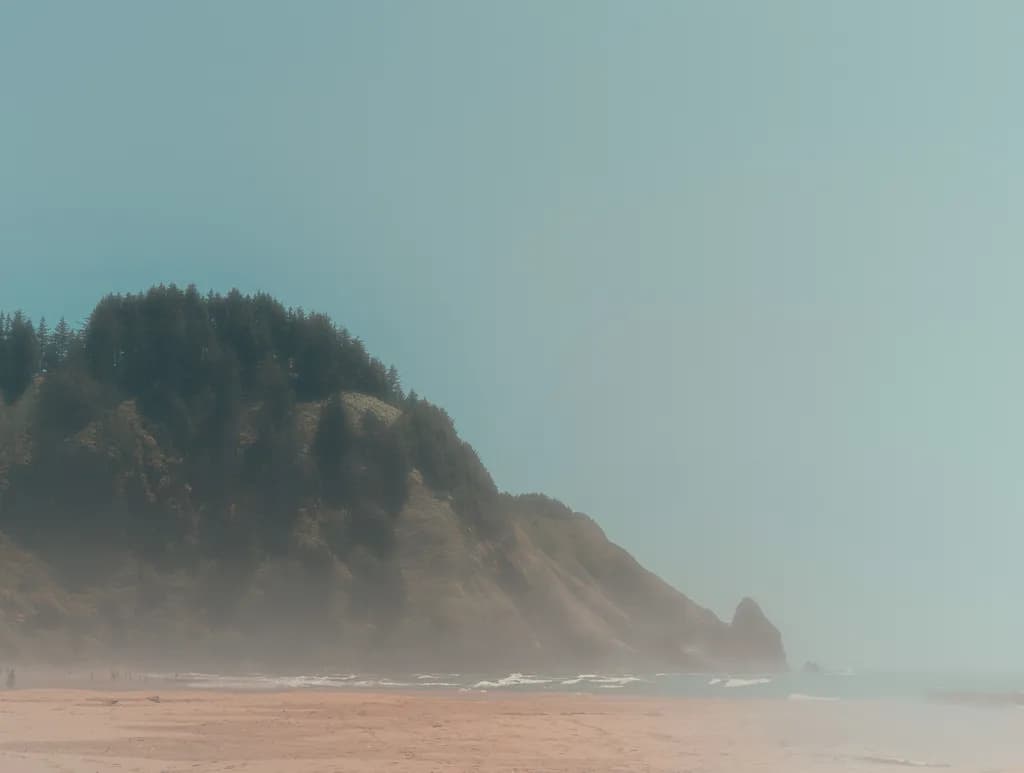 Whispers of the Mist: A Serene Coastal Landscape at Dawn