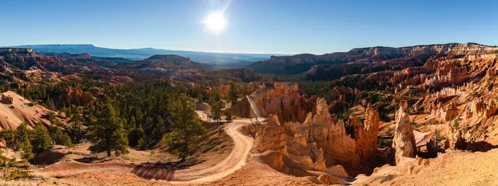 Sunlit Serenity: A Majestic Canyon Landscape at Dawn