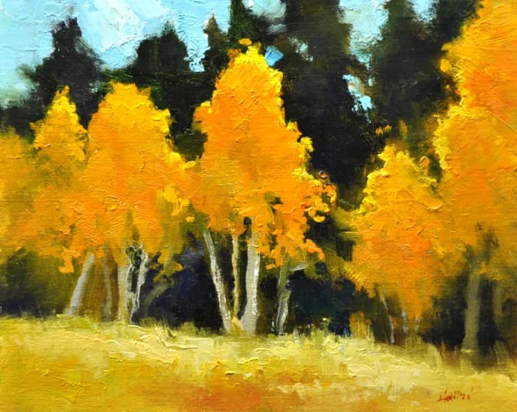 Golden Autumn Whisper: A Serene Landscape of Vibrant Trees and Tranquil Skies