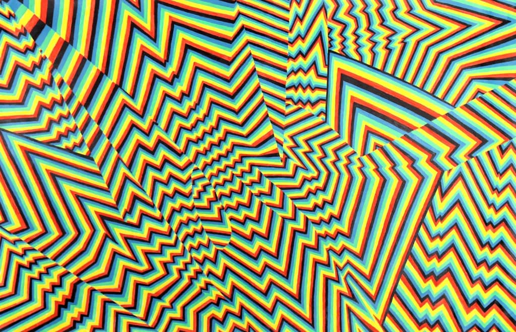 Vibrant Zigzag Symphony: An Abstract Journey Through Colorful Geometric Patterns