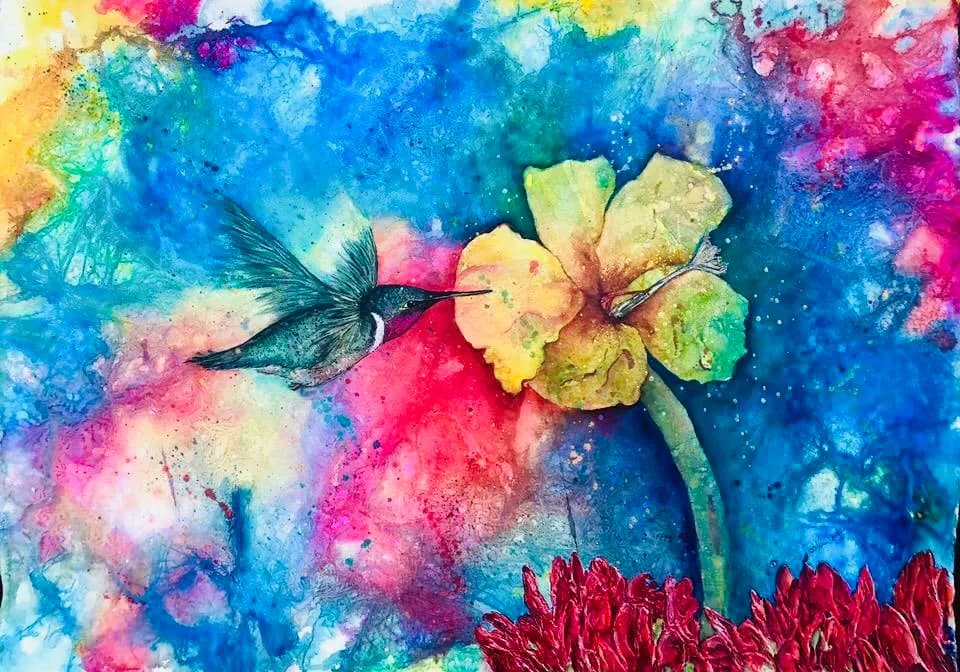 Whispers of Color: A Hummingbird's Dance Among Vibrant Blooms