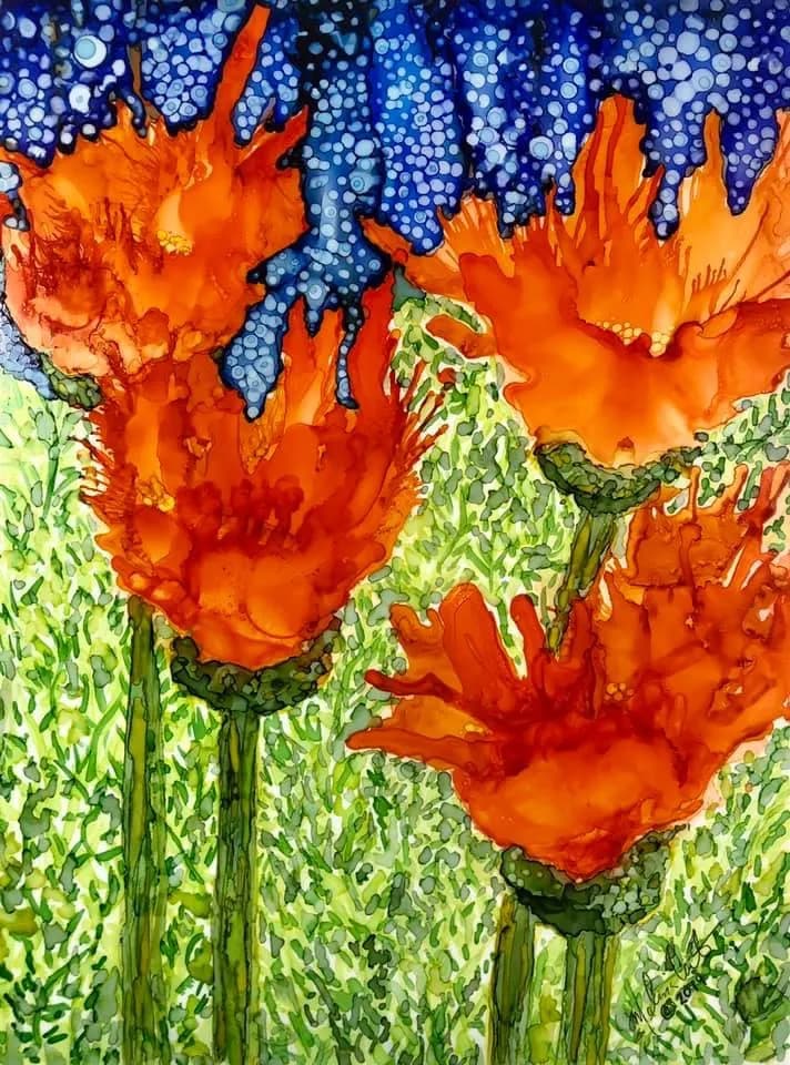 Vibrant Flames: A Dance of Orange Blossoms Against a Starry Sky
