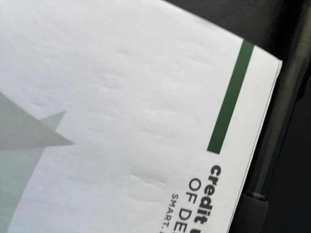 Whispers of Financial Identity: A Minimalist Exploration of Credit and Design