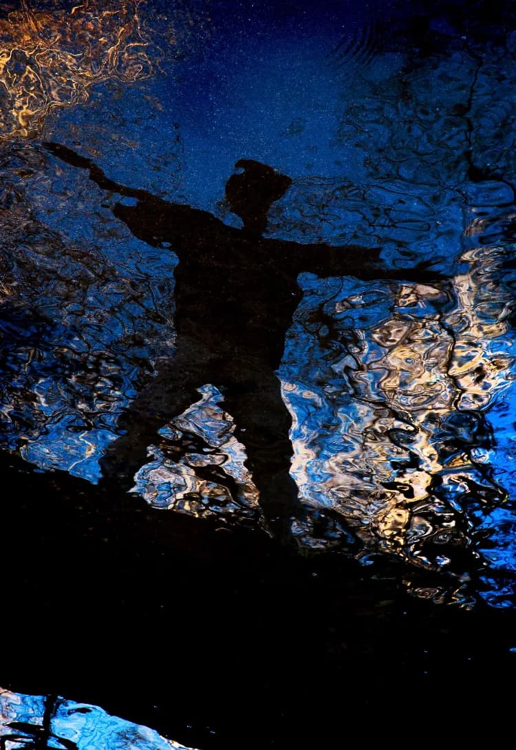 Reflections of Freedom: A Dance on Water's Surface