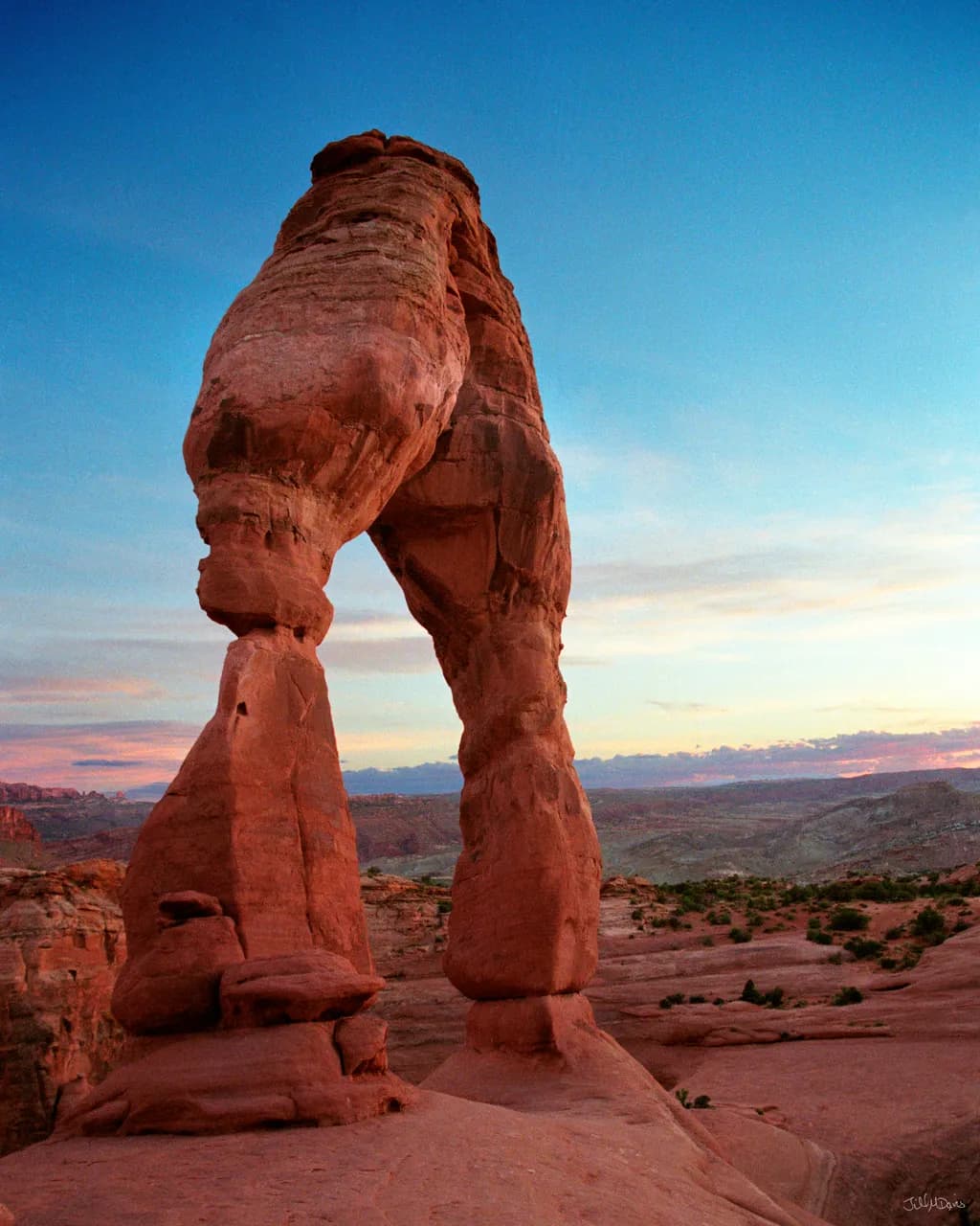 Majestic Arch: Nature's Sculpted Wonder at Dusk