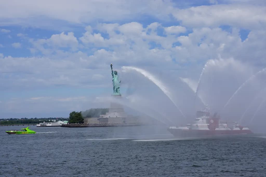 Whispers of Freedom: The Statue of Liberty Amidst Sky and Sea