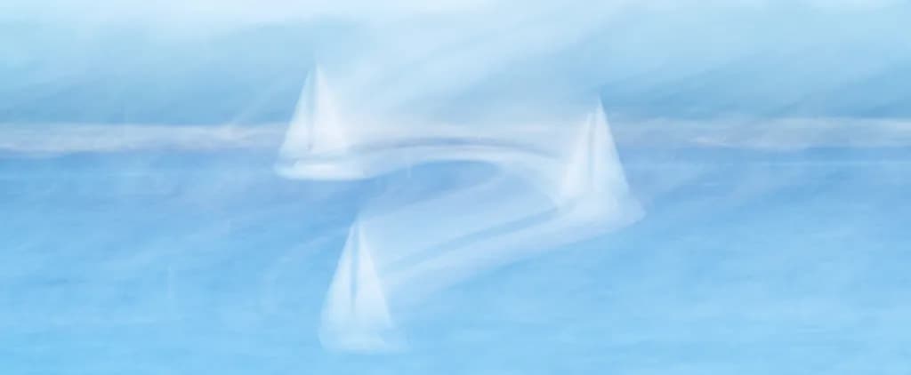 Sailing Through a Dreamscape: An Abstract Journey on Blue Waters
