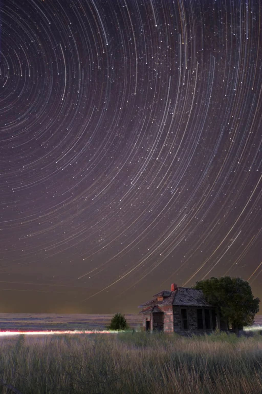 Cabin Beneath Star Trails