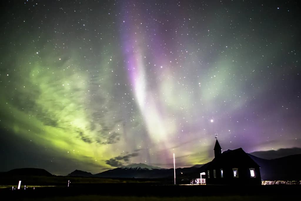 Whispers of the Northern Lights: A Sacred Dance Over Iceland's Ancient Churches ✨❤️