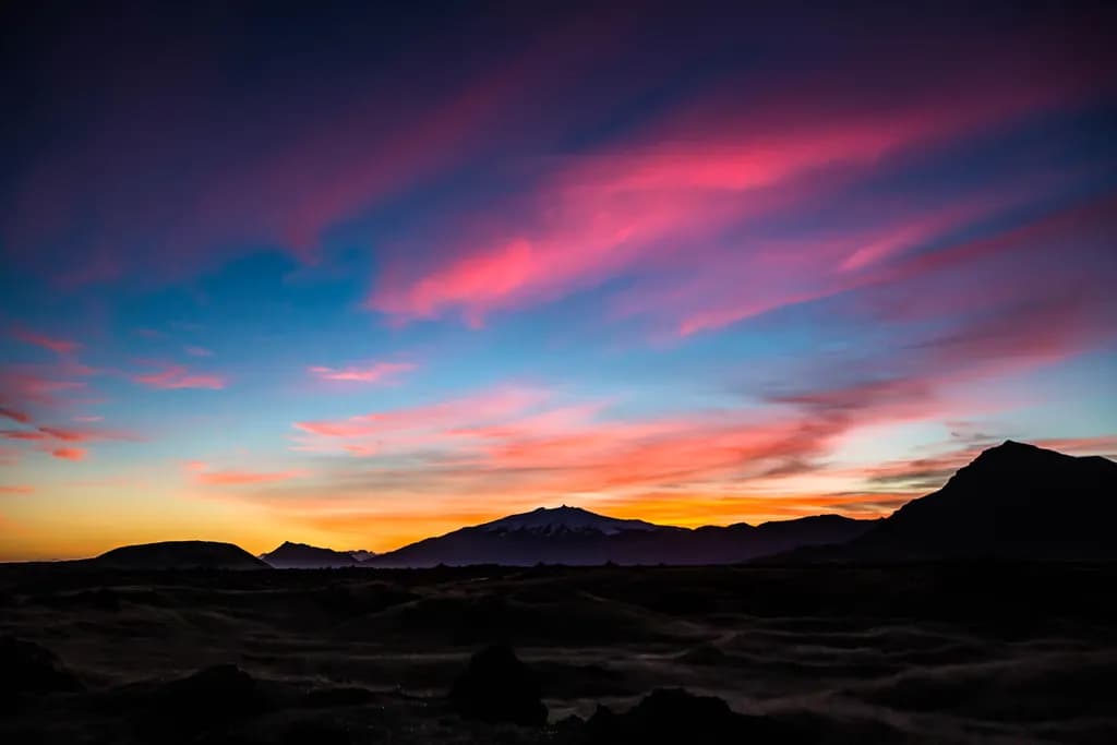 Whispers of the Sunset: A Mystical Journey Through Mountain Colors and Sky Dreams