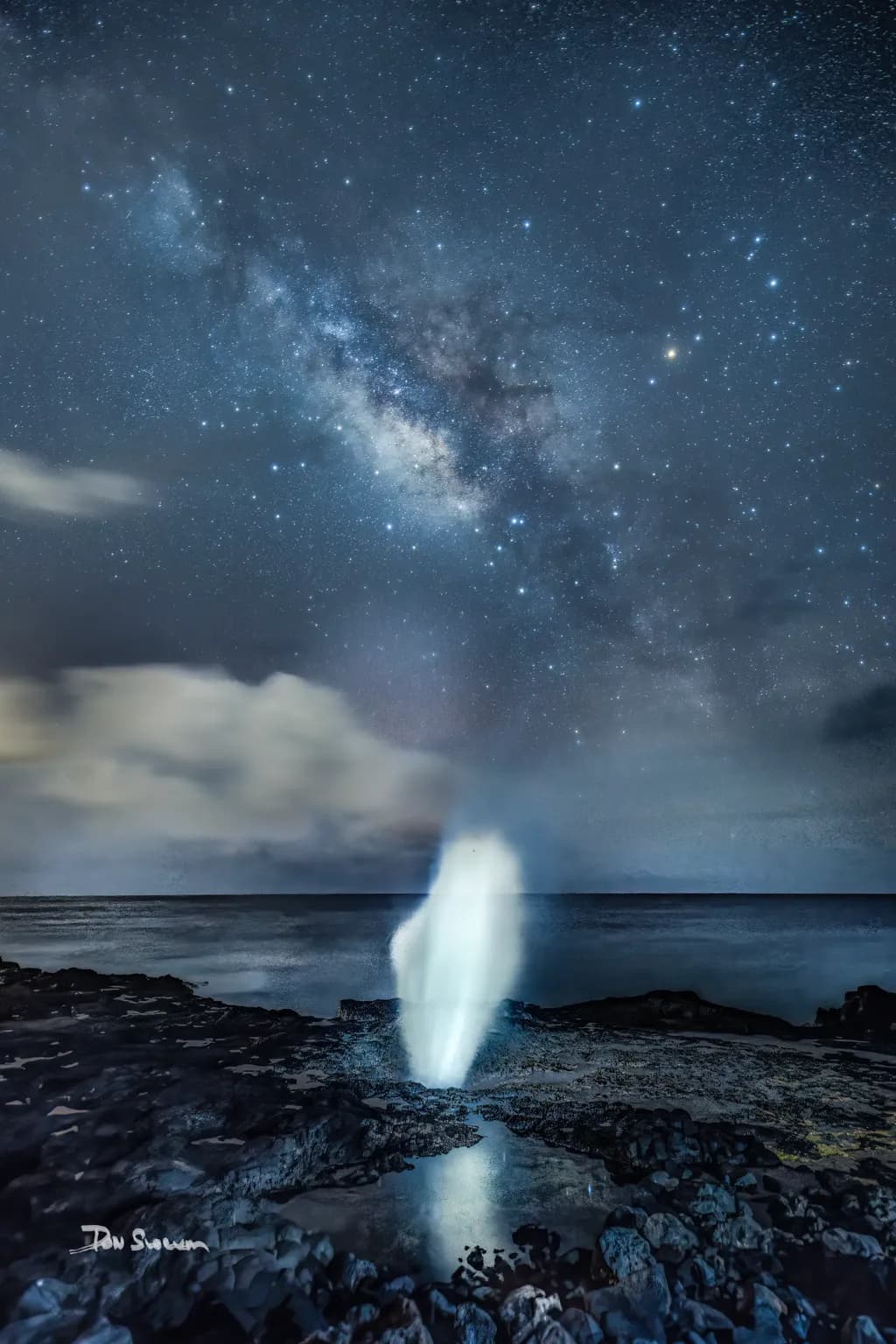 Celestial Whispers: The Dance of Stars and Ocean Mist