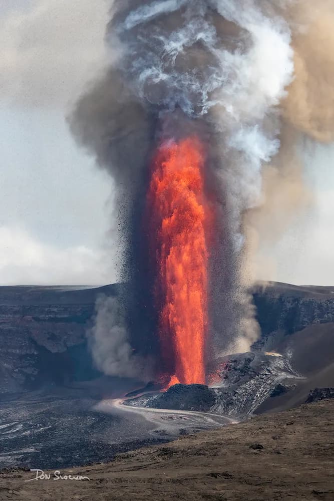 Eruption of Life: A Dance of Lava and Smoke in Nature's Embrace