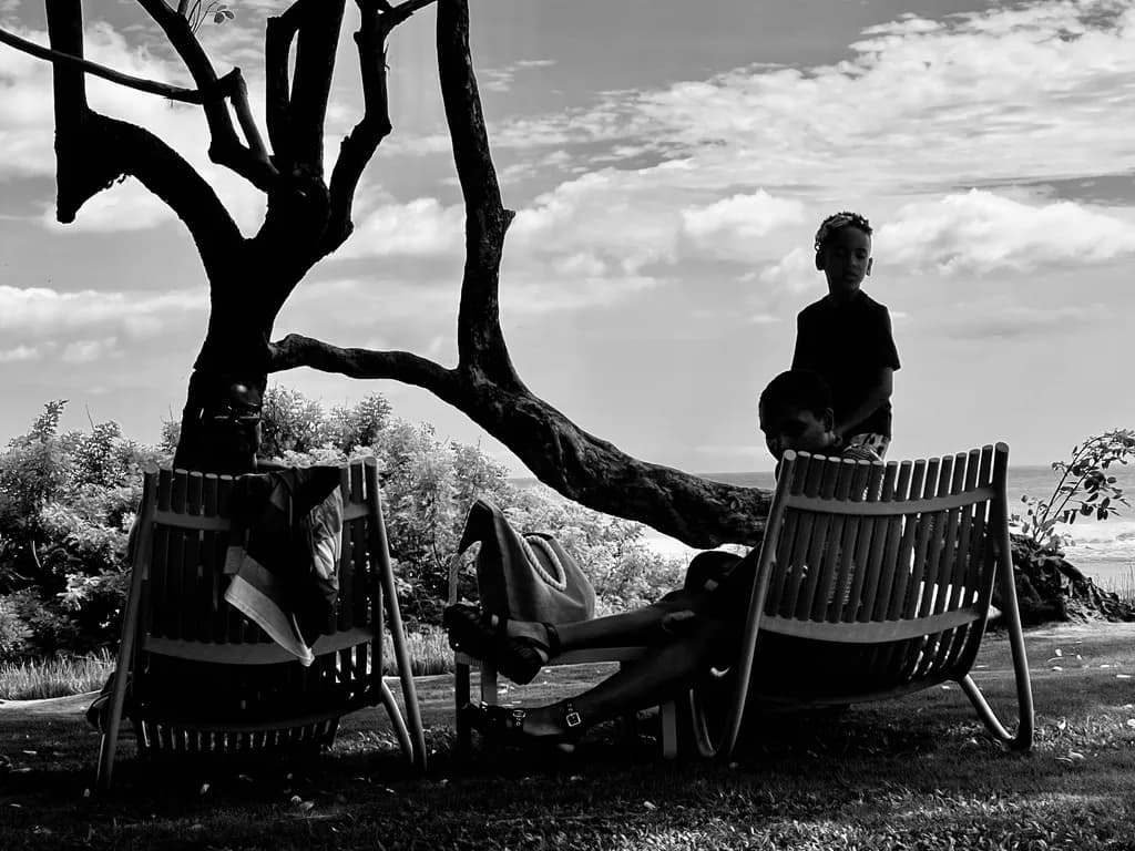 Whispers of Childhood: A Serene Moment Under the Tree