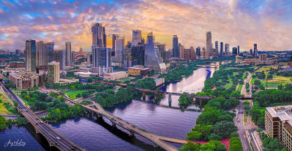 Urban Serenity: A Vibrant Sunset Over Austin's Skyline and Riverbanks