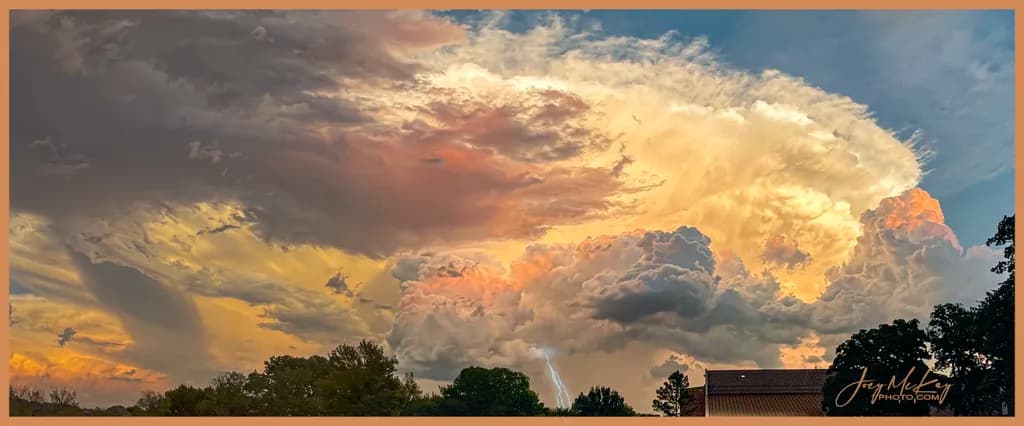Celestial Symphony: A Dance of Light and Clouds at Dusk