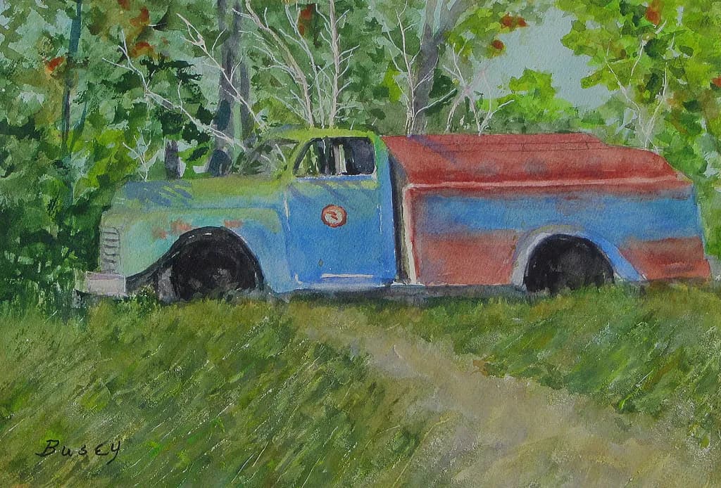 Whispers of the Past: A Vintage Truck in Nature's Embrace