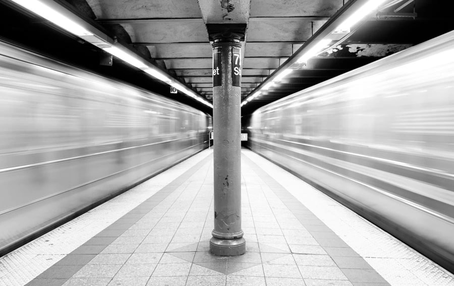 Urban Motion: A Journey Through the 7th Street Subway Station in Black and White