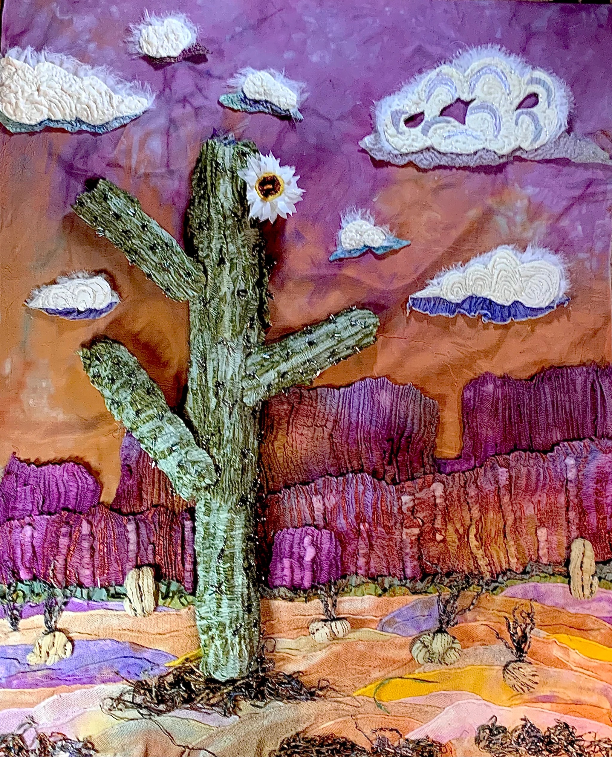 Cactus Under Cotton Clouds