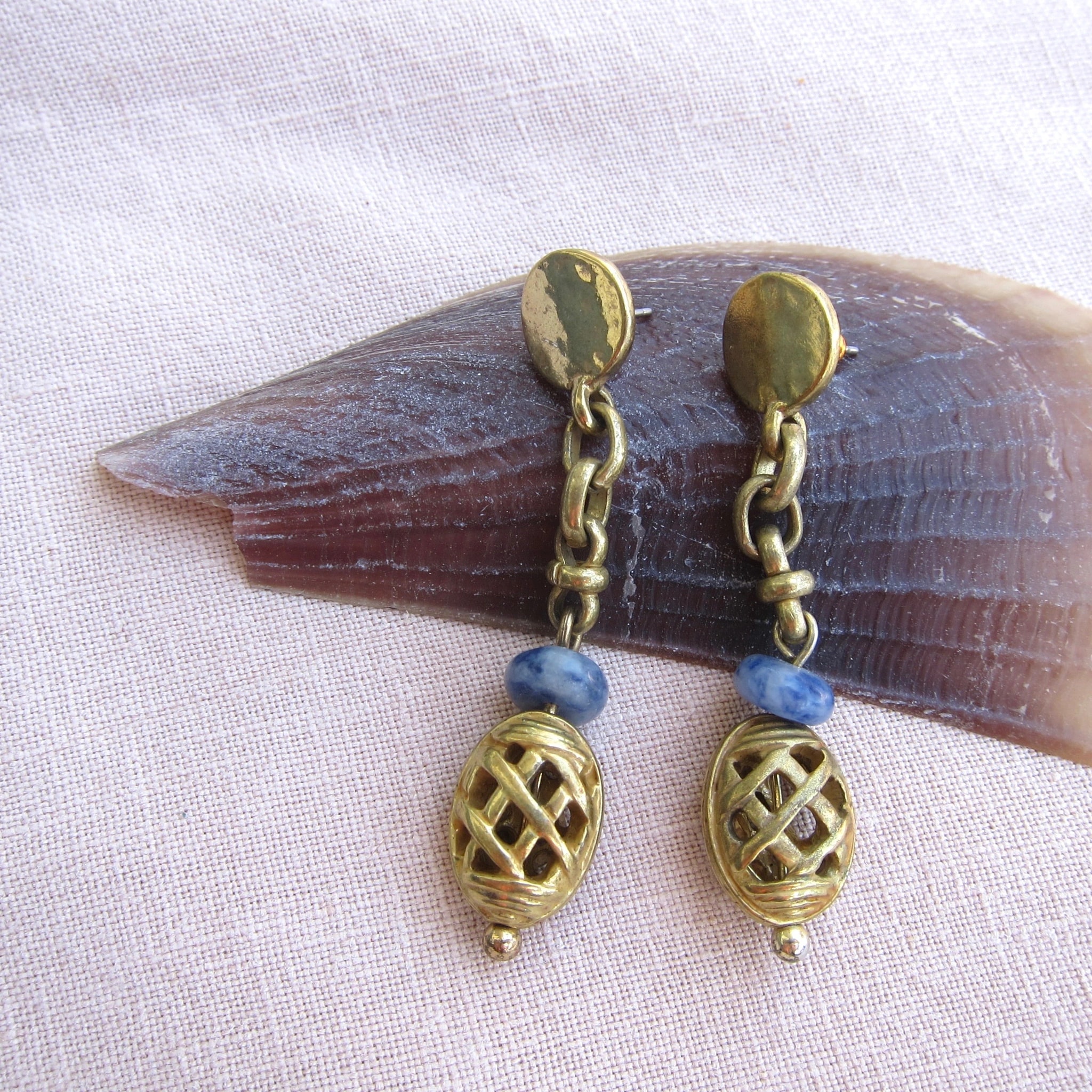 Elegant Brass and Blue Stone Drop Earrings with Intricate Design