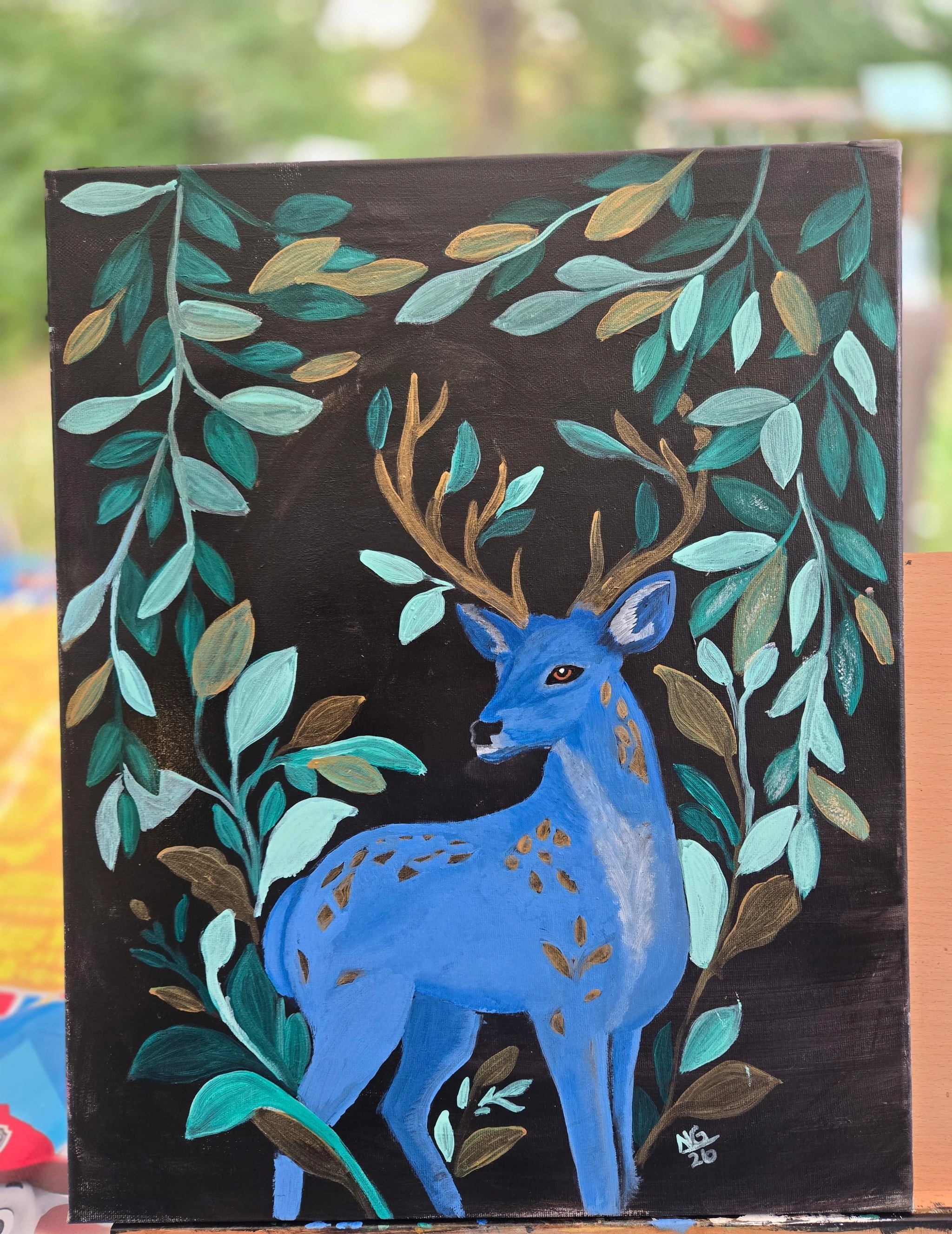 Blue Deer Among Leaves