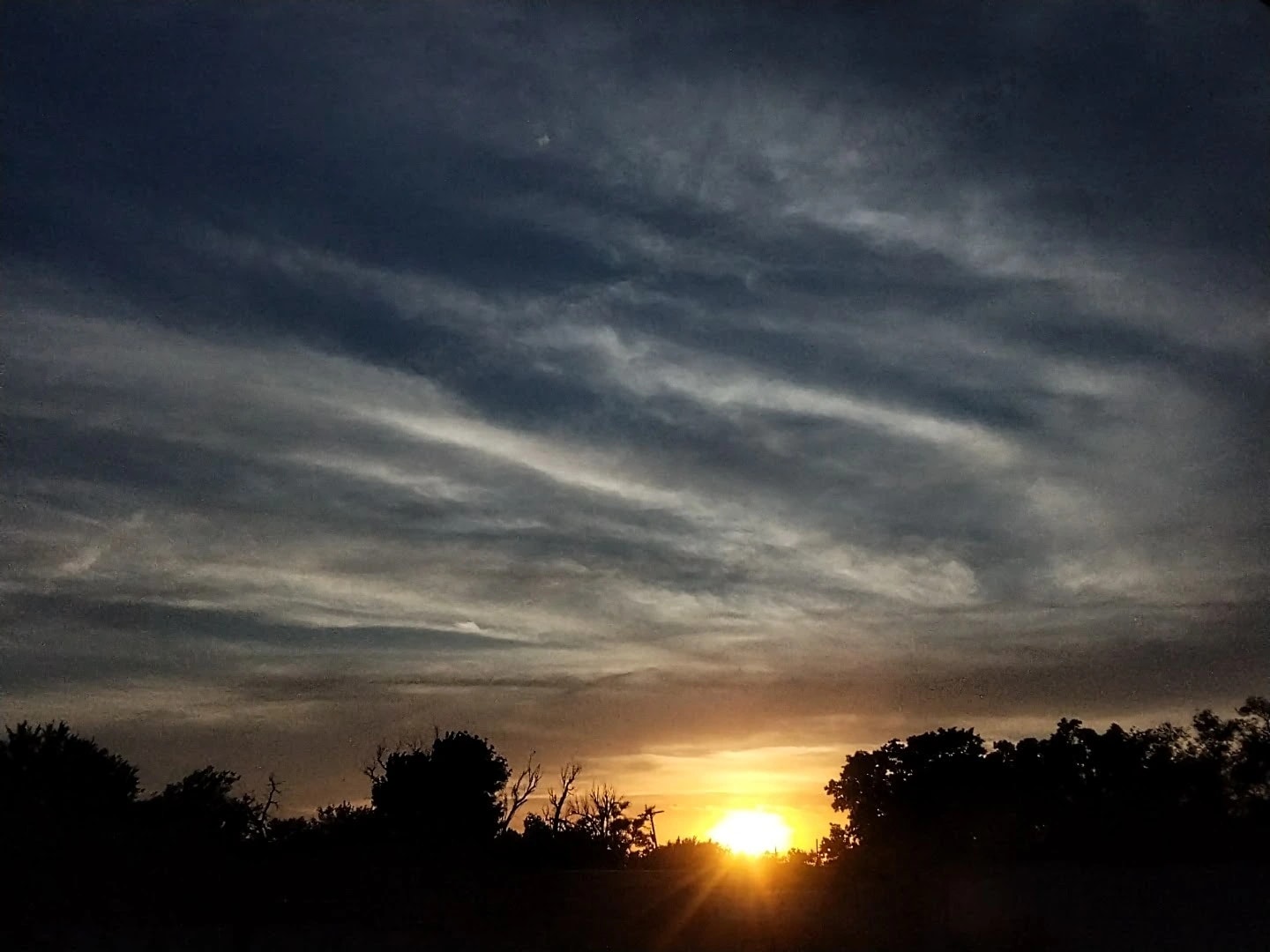 Clouded Sunset Silhouette