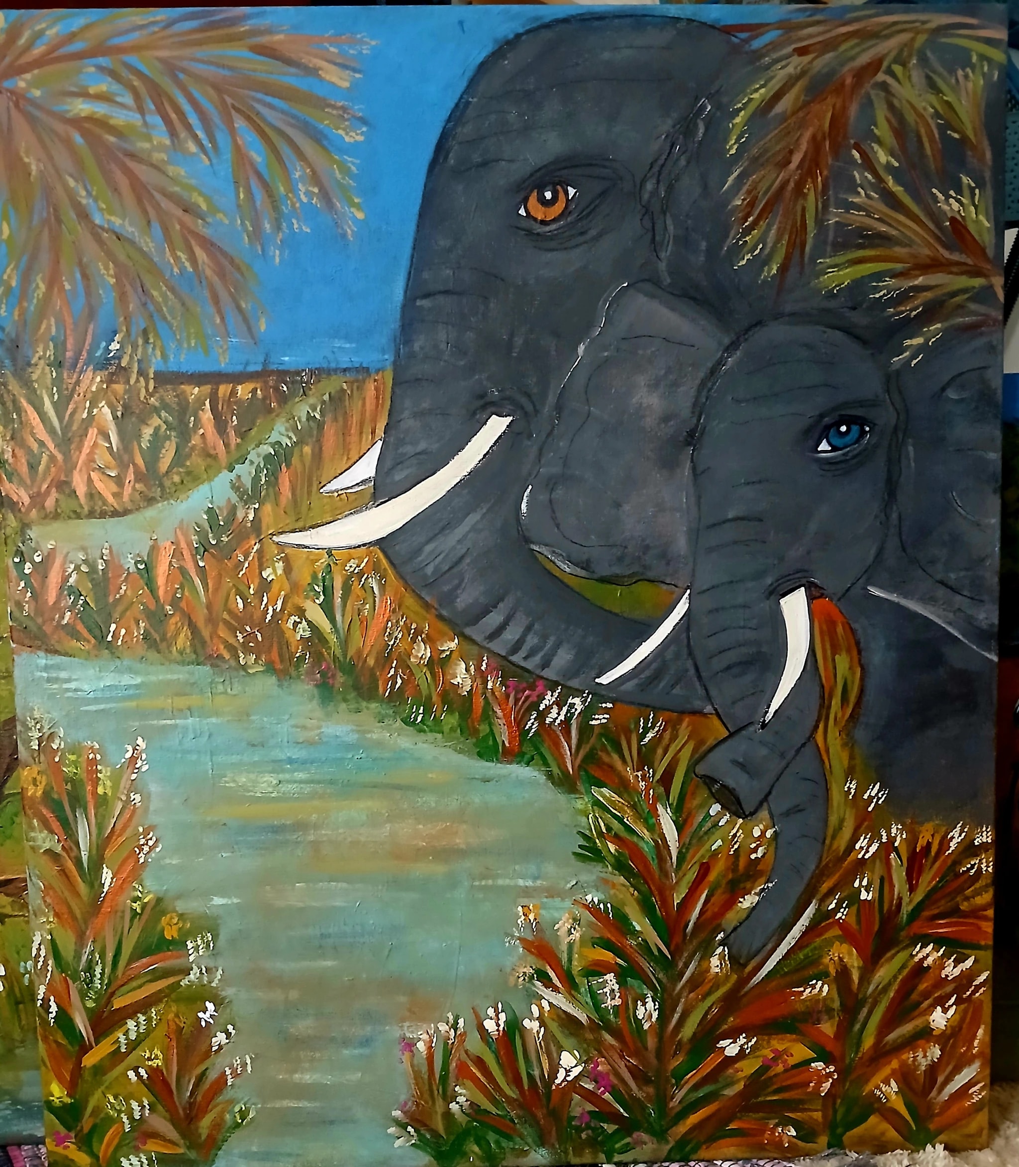 Elephants by the River
