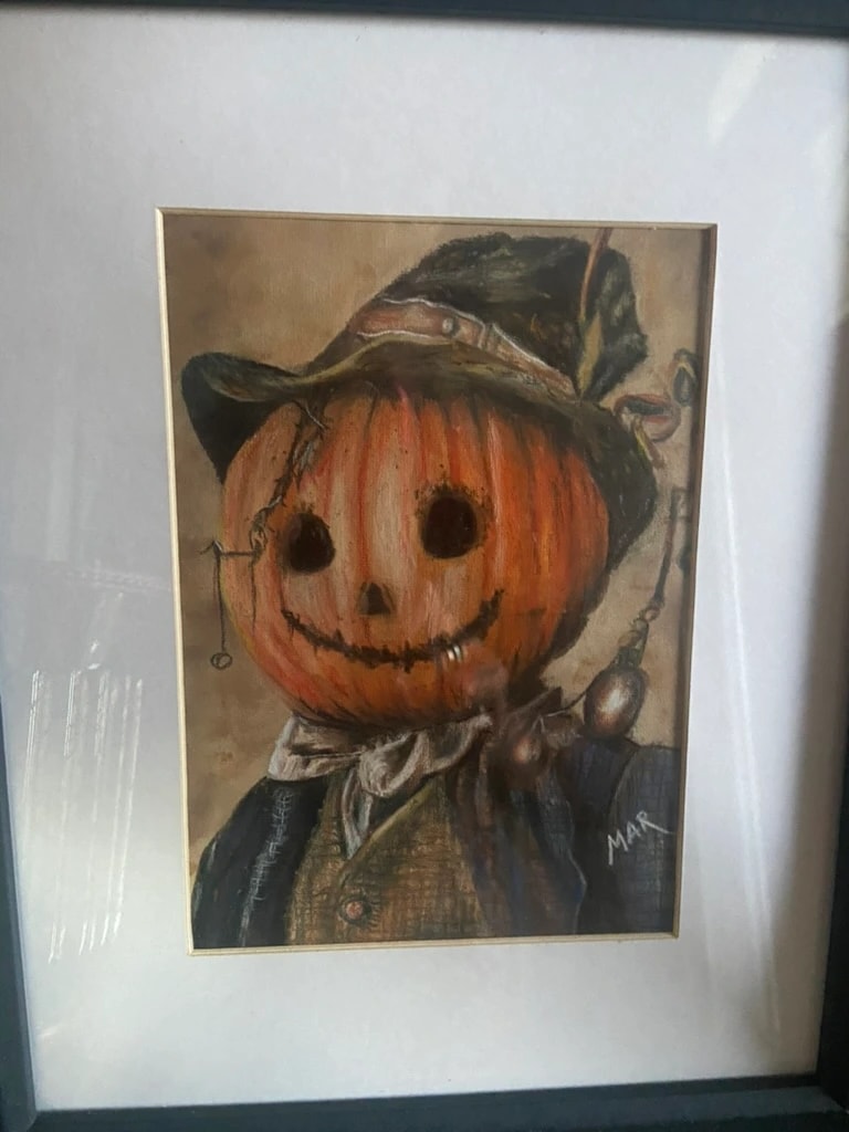 Pumpkin Scarecrow</|fim_suffix|>