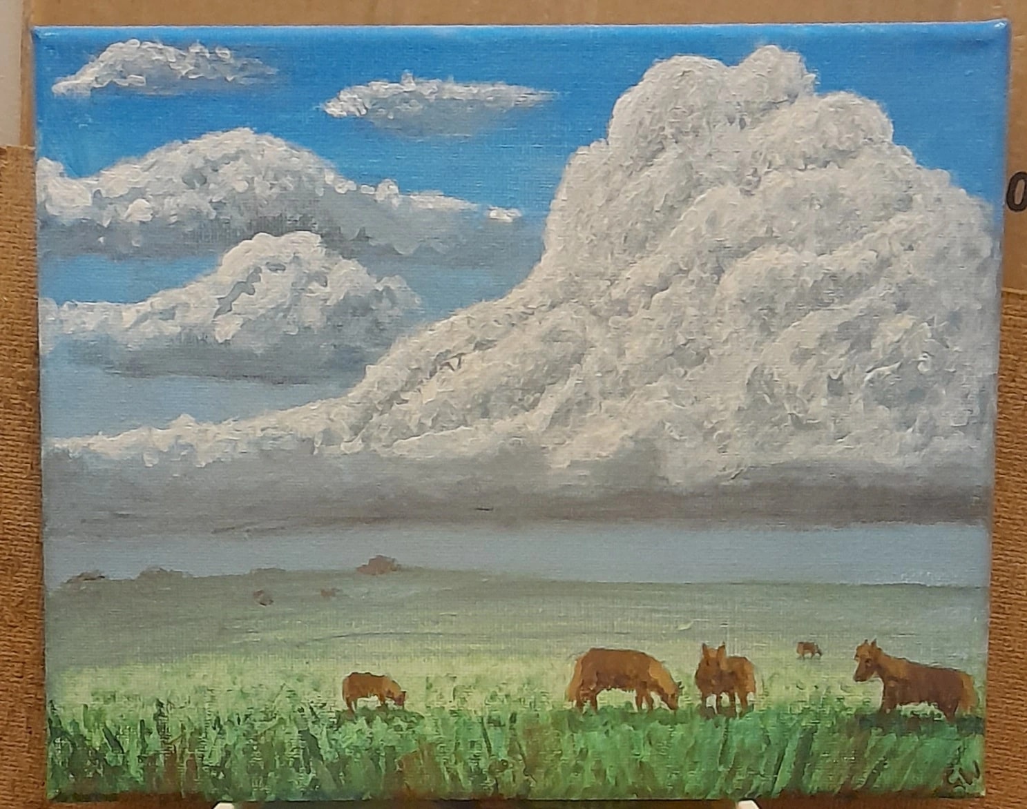 Dartmoor Ponies Beneath Towering Clouds