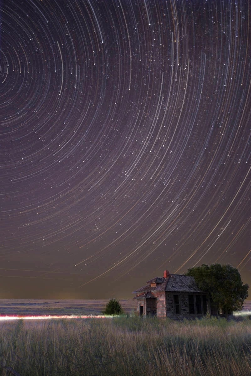 Cabin Beneath Star Trails