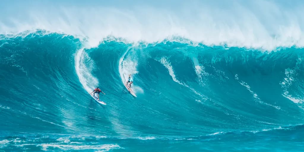 Riding the Blue Giants: A Surfing Adventure in Ocean Waves