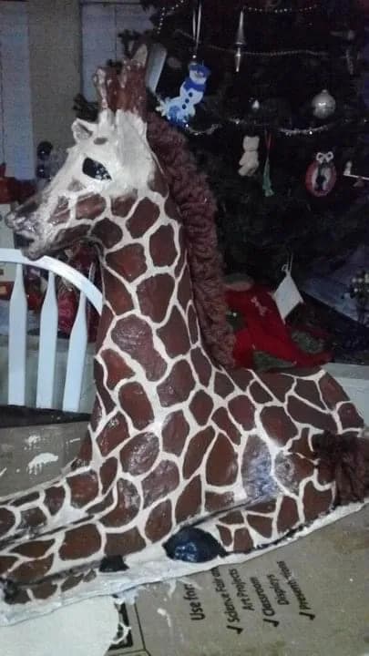 Gentle Spirit: A Whimsical Giraffe Crafted with Love and Recycled Materials