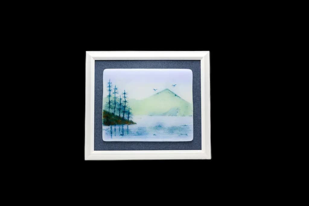 Whispers of Nature: A Serene Mountain Reflection in Tranquil Waters