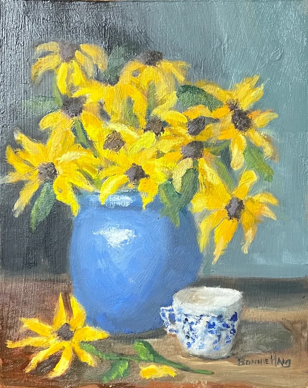 Sunflowers in Blue Vase