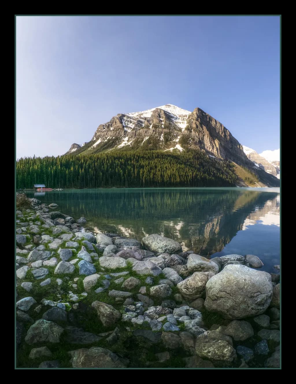 Serenity Reflected: A Majestic Mountain Landscape at Dawn