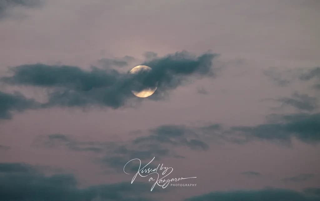 Full Moon Behind Clouds