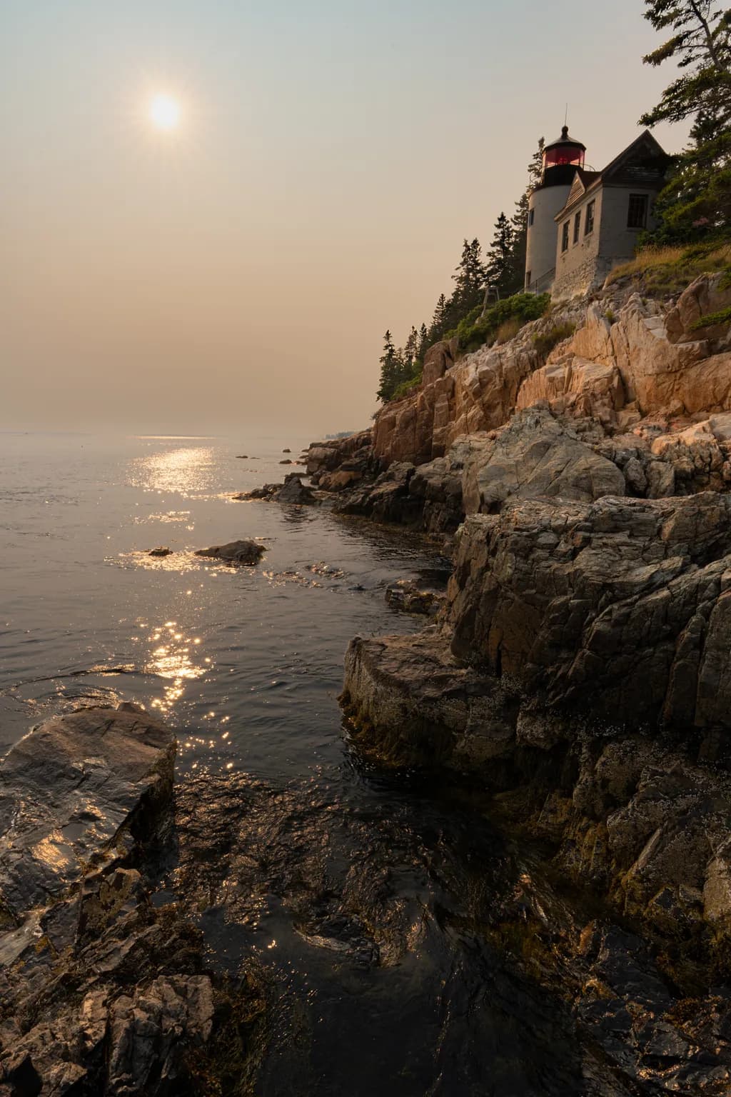 Whispers of the Coast: A Serene Sunset by the Lighthouse