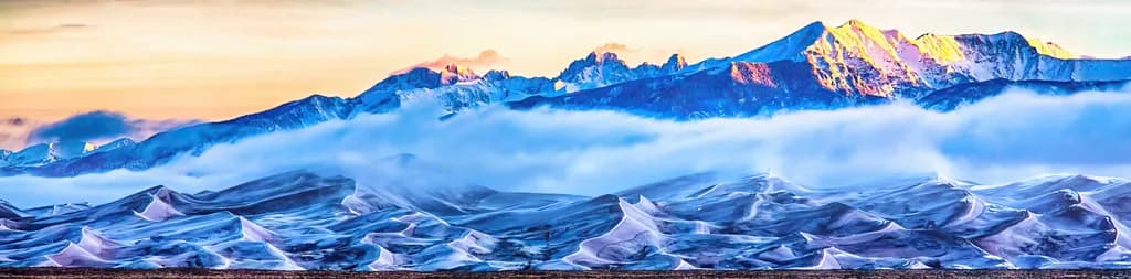 Whispers of the Mountains: A Serene Dance of Snow and Clouds