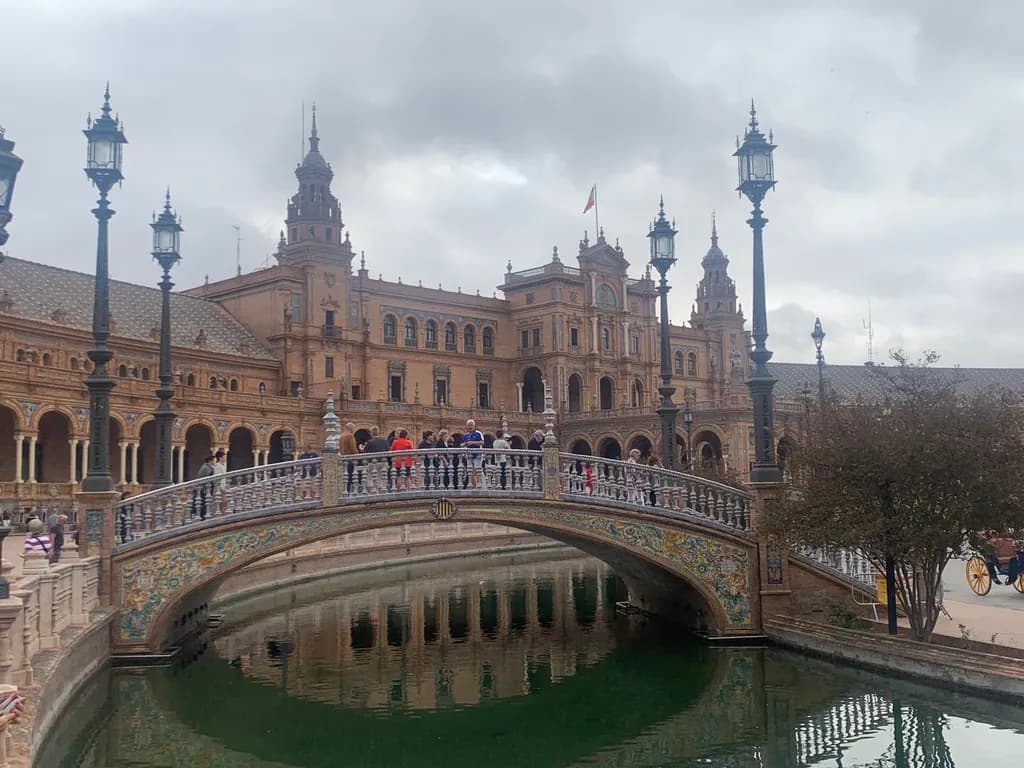 Whispers of History: The Majestic Bridge Over Tranquil Waters at Plaza de España