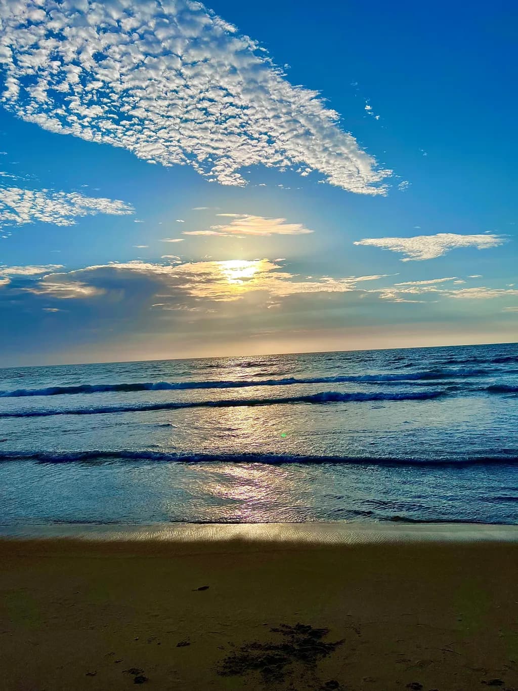 Serenity at Dusk: A Tranquil Seascape Embracing the Golden Horizon