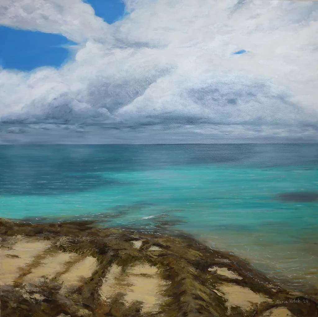Serenity by the Shore: A Tranquil Ocean Landscape with Clouds and Blue Skies