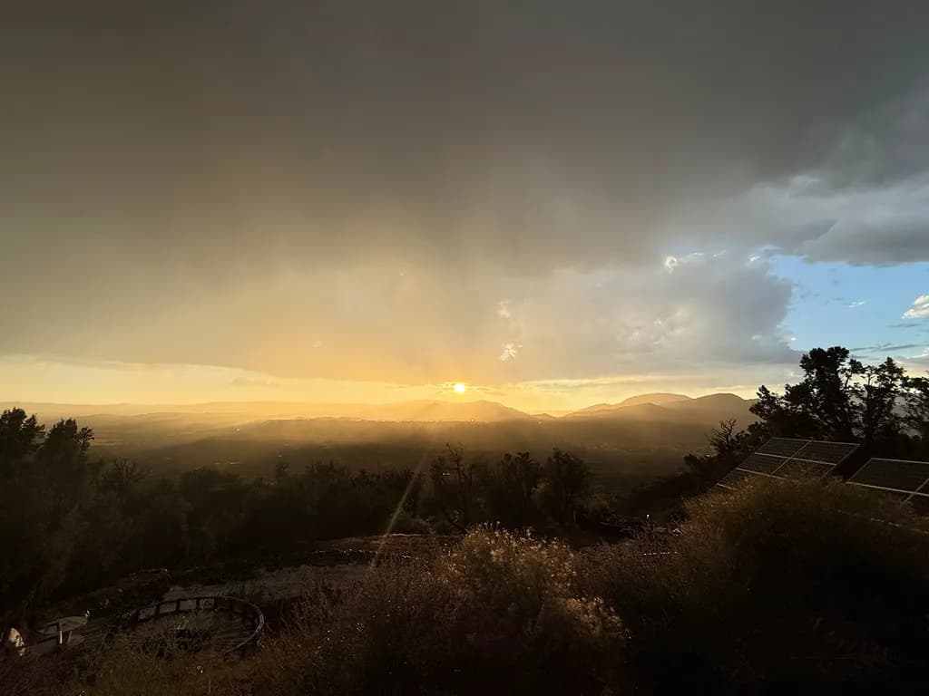 Golden Horizon: A Serene Sunset Over the Mountains