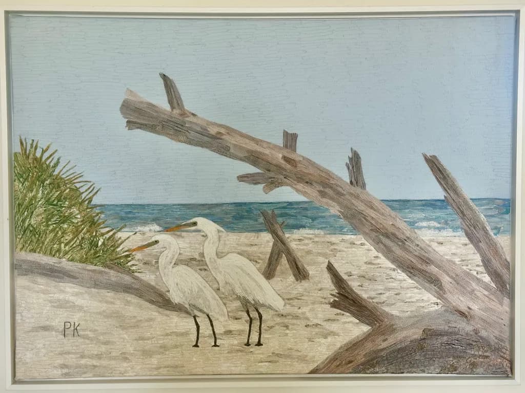 Serenity by the Shore: Egrets and Driftwood in Coastal Harmony