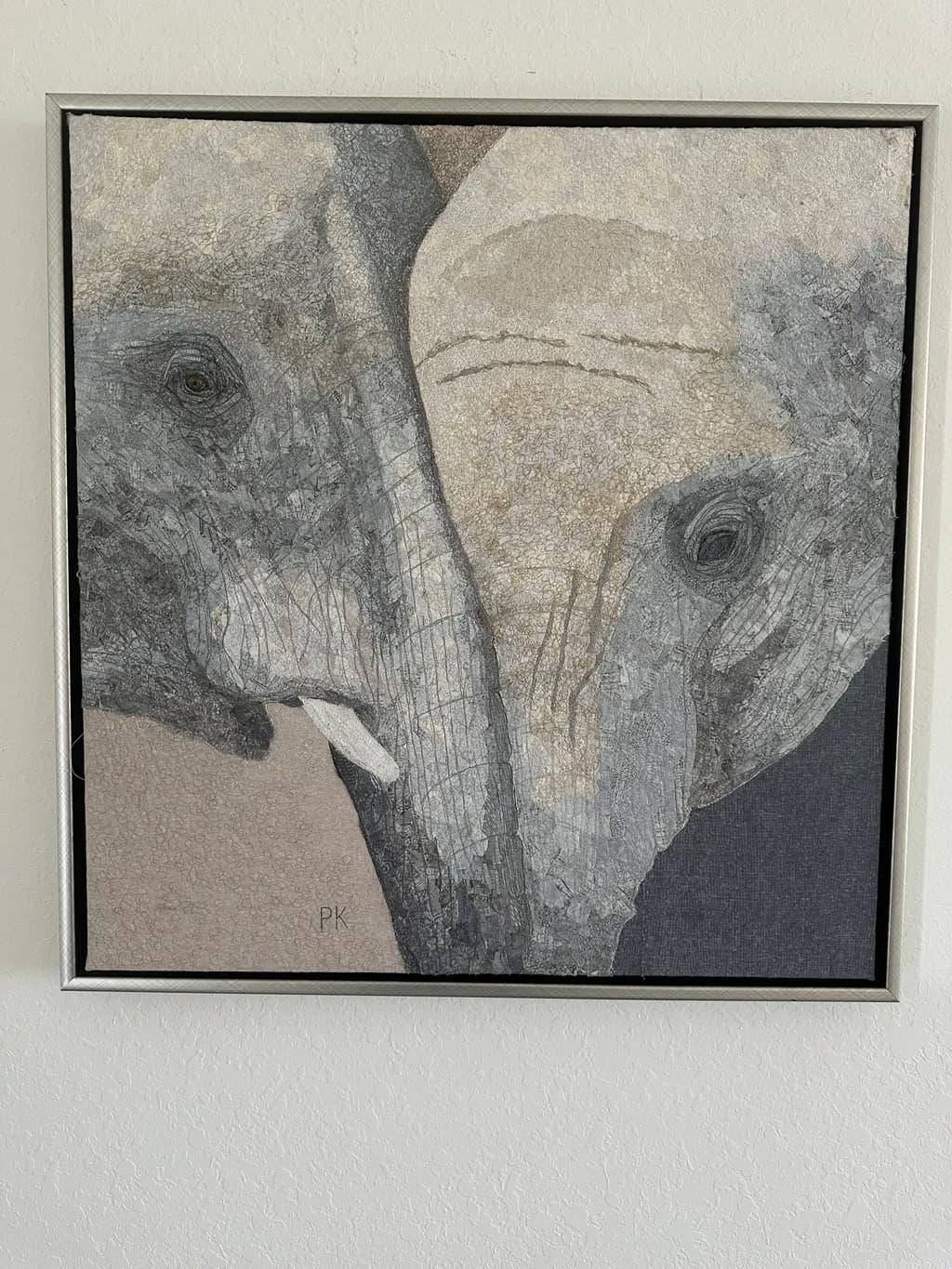 Whispers of the Wild: A Textured Portrait of Elephants in Gray Tones