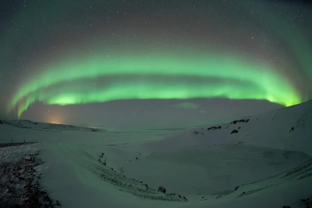 Northern Lights Over Snow