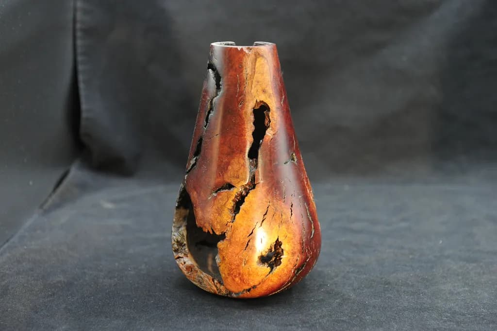 Nature's Embrace: A Handcrafted Vessel Inspired by Ancient Pottery Techniques