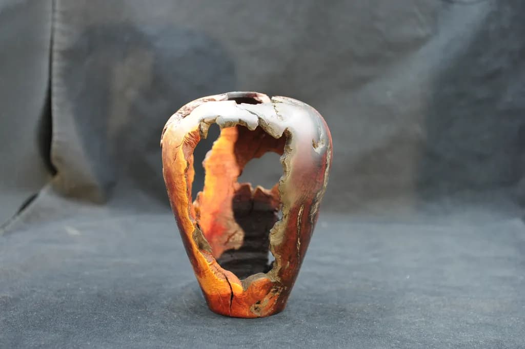 Nature's Embrace: A Unique Wooden Vase Inspired by Historical Native Pottery