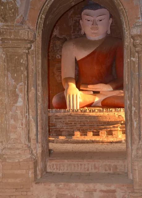 Serenity in Stone: The Majestic Buddha Within Ancient Walls