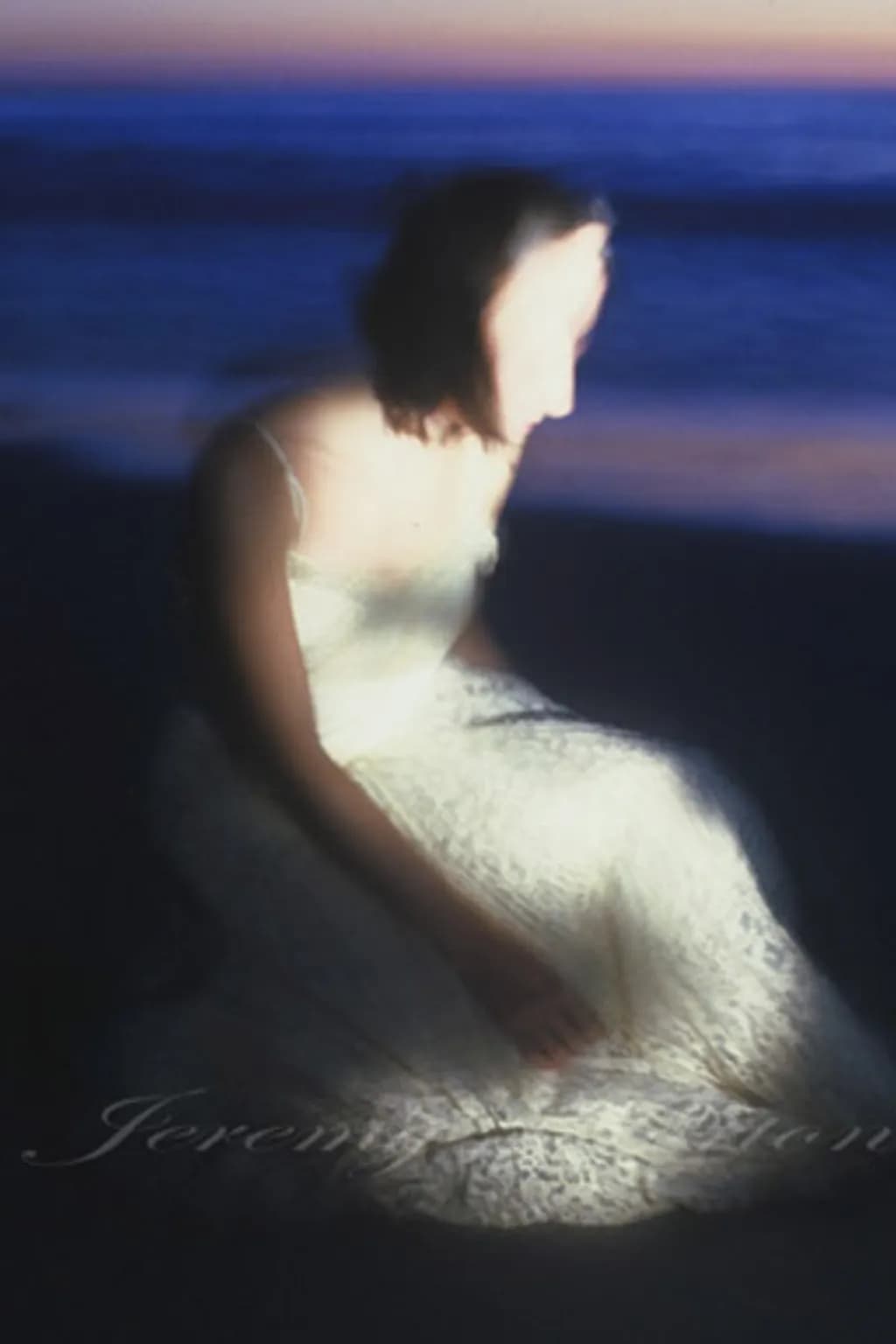 Woman in White Dress at Dusk